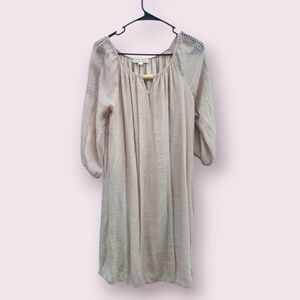 Indigo Rose cream blouse or dress, which features three-quart Lace Sleeves